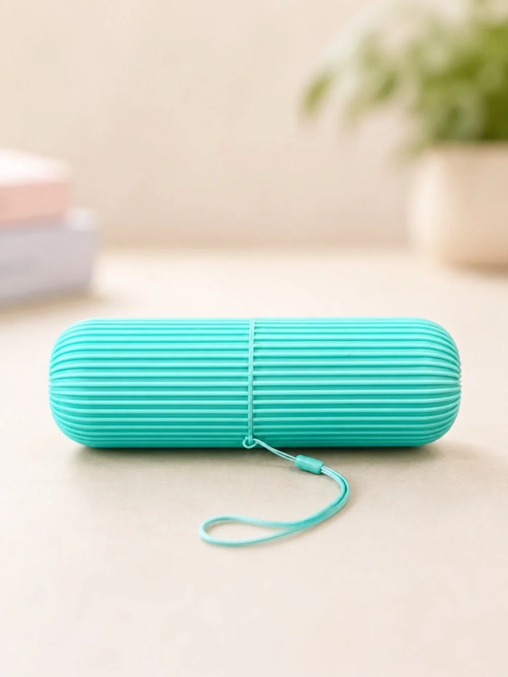 Aqua Ribbed Capsule Case with Wrist Strap